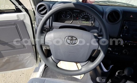 Sayi Imported Toyota Land Cruiser White Mota in Import - Dubai a Benin Sayi Imported Toyota Land Cruiser White Mota in Import - Dubai a Benin