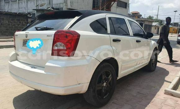 Ra Àlòkù Dodge Caliber funfun Ọkọ̀ in Abomey ni Benin Ra Àlòkù Dodge Caliber funfun Ọkọ̀ in Abomey ni Benin