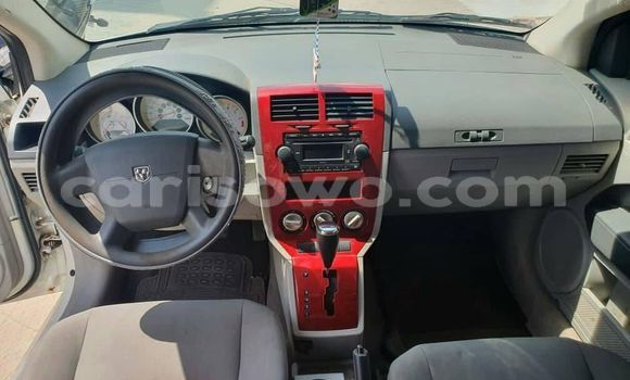 Ra Àlòkù Dodge Caliber funfun Ọkọ̀ in Abomey ni Benin Ra Àlòkù Dodge Caliber funfun Ọkọ̀ in Abomey ni Benin
