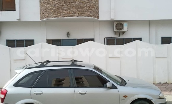 Acheter Occasion Voiture Mazda 323 Blanc à Abomey Calavi, Benin Acheter Occasion Voiture Mazda 323 Blanc à Abomey Calavi, Benin