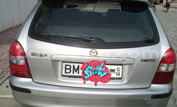 Acheter Occasion Voiture Mazda 323 Blanc à Abomey Calavi, Benin Acheter Occasion Voiture Mazda 323 Blanc à Abomey Calavi, Benin