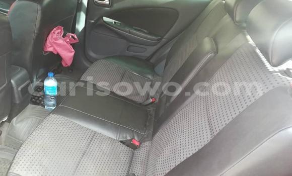 Acheter Occasion Voiture Nissan Almera Rouge à Cotonou, Benin