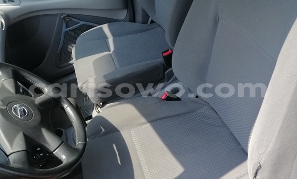 Sayi Na hannu Nissan Almera Tino Red Mota in Cotonou a Benin Sayi Na hannu Nissan Almera Tino Red Mota in Cotonou a Benin