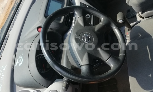 Sayi Na hannu Nissan Almera Tino Red Mota in Cotonou a Benin Sayi Na hannu Nissan Almera Tino Red Mota in Cotonou a Benin