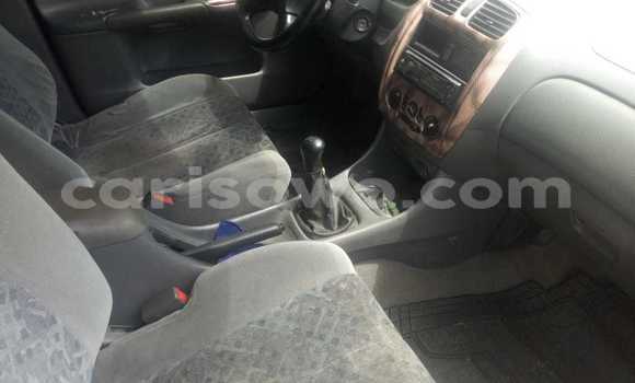 Sayi Na hannu Mazda 323 White Mota in Cotonou a Benin Sayi Na hannu Mazda 323 White Mota in Cotonou a Benin