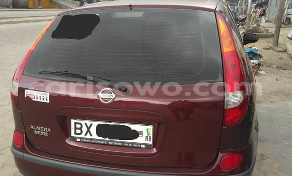 Sayi Na hannu Nissan Almera Tino Red Mota in Cotonou a Benin