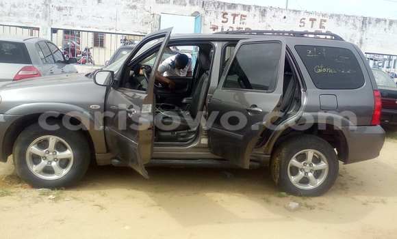 Sayi Na hannu Mazda Tribute Brown Mota in Porto Novo a Benin Sayi Na hannu Mazda Tribute Brown Mota in Porto Novo a Benin