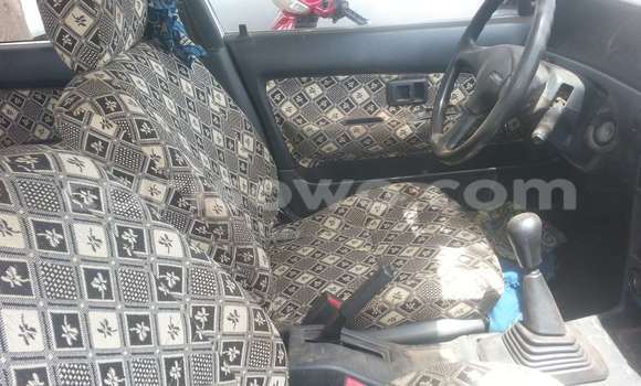 Sayi Na hannu Toyota Corolla White Mota in Parakou a Benin Sayi Na hannu Toyota Corolla White Mota in Parakou a Benin