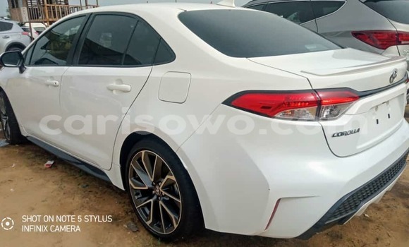 Sayi Sabo Toyota Corolla White Mota in Cotonou a Benin Sayi Sabo Toyota Corolla White Mota in Cotonou a Benin