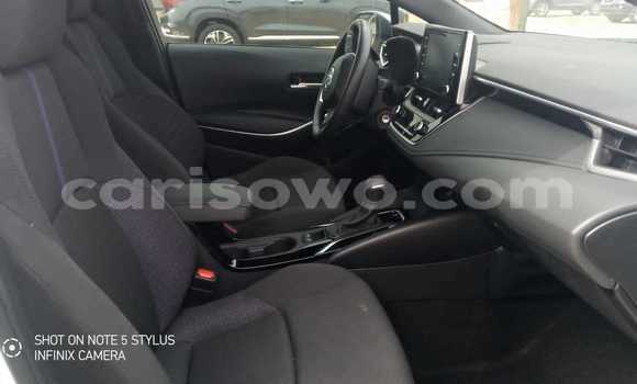 Sayi Sabo Toyota Corolla White Mota in Cotonou a Benin Sayi Sabo Toyota Corolla White Mota in Cotonou a Benin