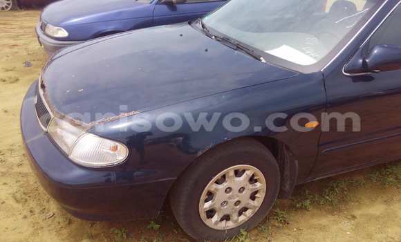 Sayi Na hannu Kia Carens Blue Mota in Porto Novo a Benin