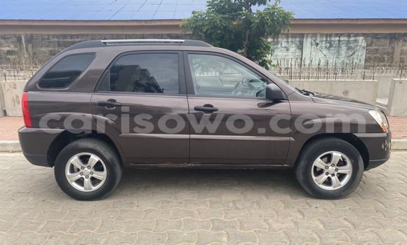 Sayi Na hannu Kia Sportage Brown Mota in Cotonou a Benin Sayi Na hannu Kia Sportage Brown Mota in Cotonou a Benin